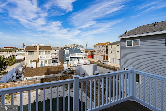 balcony featuring a residential view