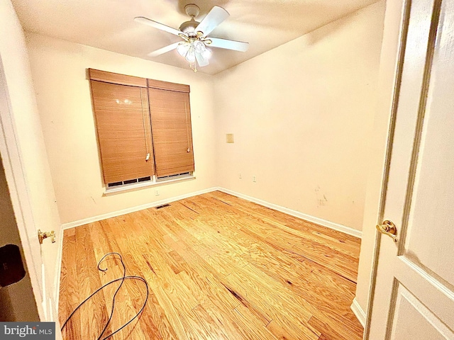 unfurnished bedroom featuring ceiling fan and light hardwood / wood-style floors