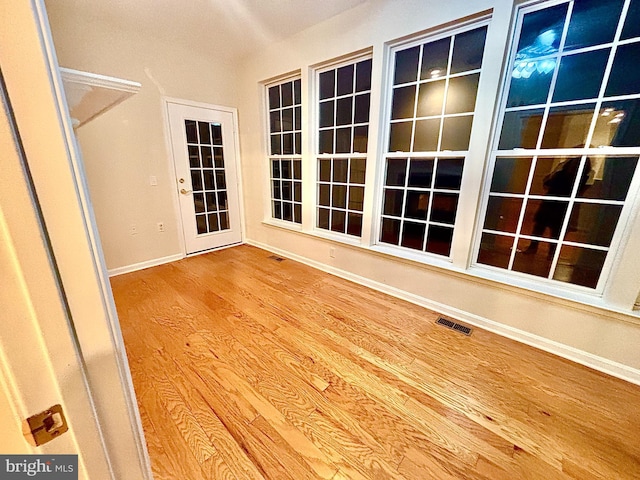 view of unfurnished sunroom