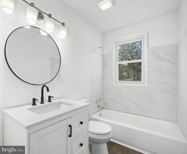 9732 Garis Shop Rd, Hagerstown, MD 21740 - bathroom with vanity, toilet, and bathtub / shower combination