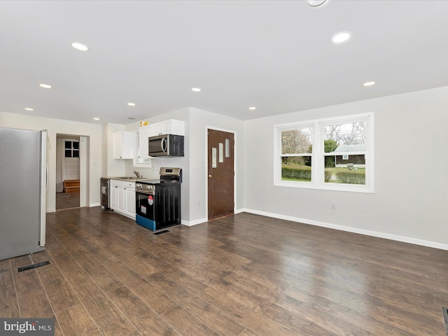 9732 Garis Shop Rd, Hagerstown, MD 21740 - kitchen featuring stainless steel appliances, a sink, white cabinets, recessed lighting, and baseboards