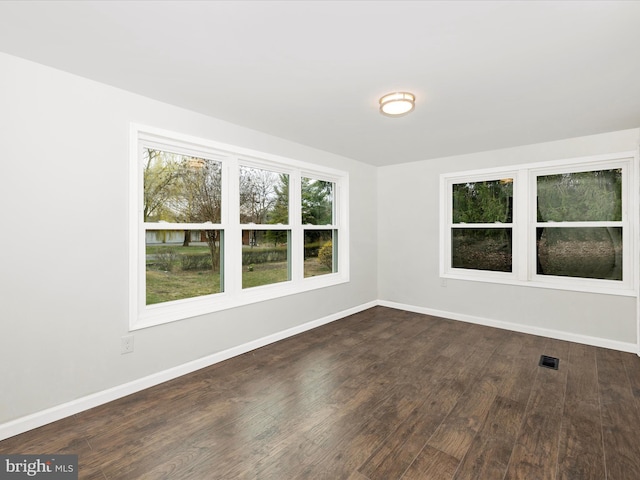 9732 Garis Shop Rd, Hagerstown, MD 21740 - unfurnished room featuring baseboards and dark wood-type flooring