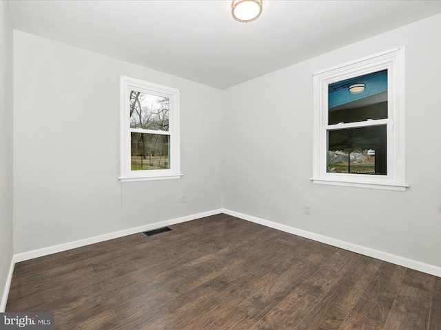 9732 Garis Shop Rd, Hagerstown, MD 21740 - empty room featuring baseboards and dark wood-type flooring