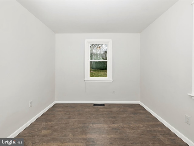 9732 Garis Shop Rd, Hagerstown, MD 21740 - empty room with dark wood finished floors and baseboards