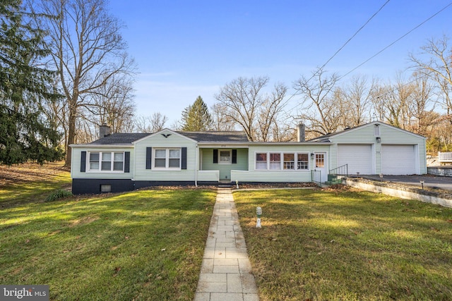 9732 Garis Shop Rd, Hagerstown, MD 21740 - view of front facade with a chimney, asphalt driveway, a garage, and a front yard