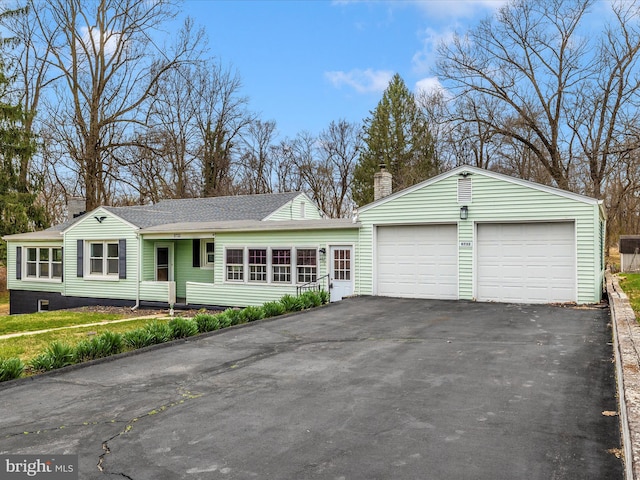 9732 Garis Shop Rd, Hagerstown, MD 21740 - single story home with roof with shingles, a chimney, and driveway