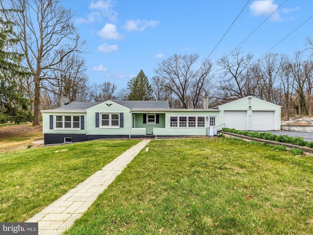 9732 Garis Shop Rd, Hagerstown, MD 21740 - view of front of house featuring a front lawn, a chimney, asphalt driveway, and a shingled roof