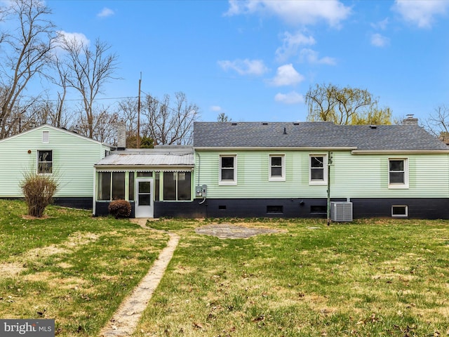 9732 Garis Shop Rd, Hagerstown, MD 21740 - rear view of house with a sunroom, cooling unit, a lawn, a chimney, and roof with shingles