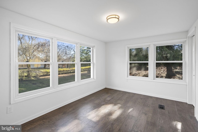 9732 Garis Shop Rd, Hagerstown, MD 21740 - empty room with dark wood-style floors and baseboards