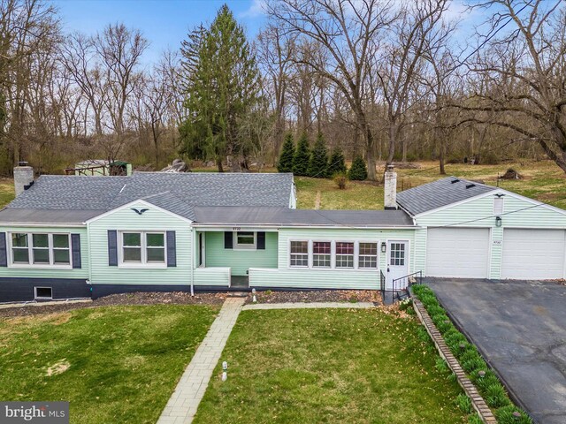 9732 Garis Shop Rd, Hagerstown, MD 21740 - ranch-style home with asphalt driveway, a front lawn, an attached garage, a chimney, and roof with shingles