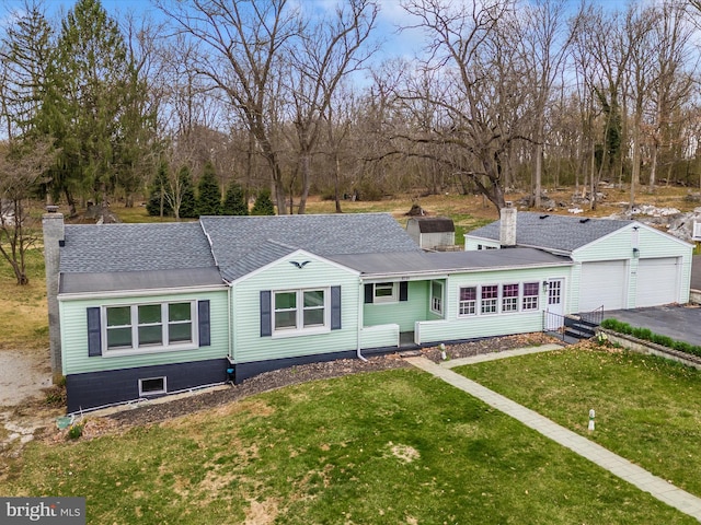 9732 Garis Shop Rd, Hagerstown, MD 21740 - view of front of home featuring driveway, a front yard, a shingled roof, and a chimney