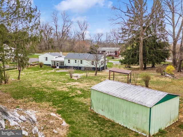 9732 Garis Shop Rd, Hagerstown, MD 21740 - view of grassy yard with an outdoor structure