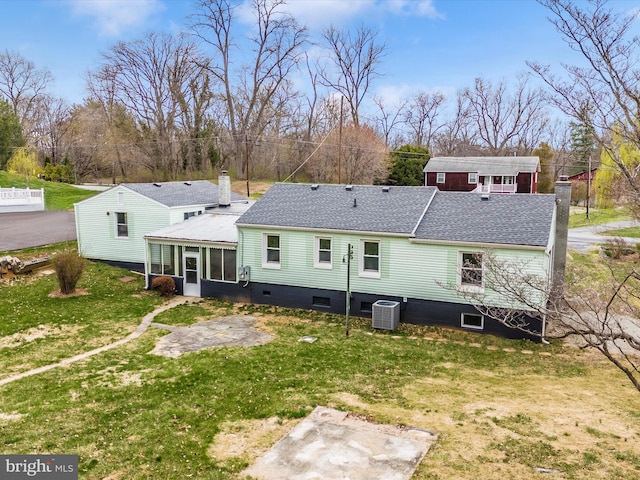 9732 Garis Shop Rd, Hagerstown, MD 21740 - back of house with a sunroom, a lawn, cooling unit, and a shingled roof
