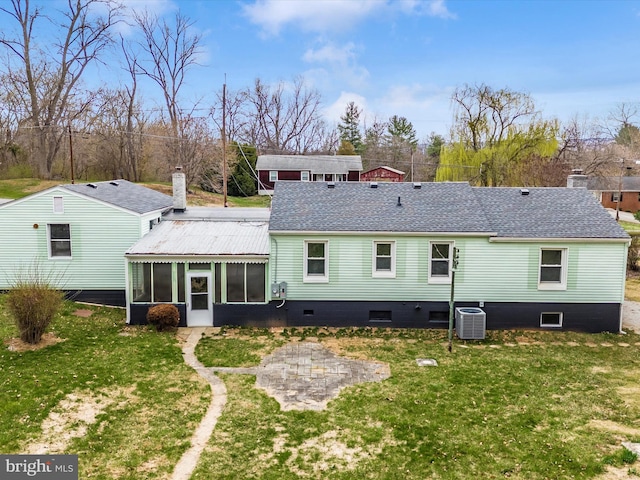 9732 Garis Shop Rd, Hagerstown, MD 21740 - back of house with a sunroom, a yard, central AC, and a chimney