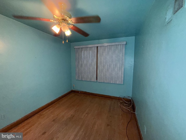 spare room featuring ceiling fan and light wood-type flooring