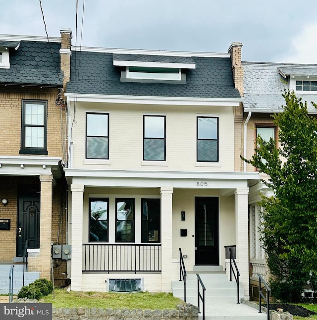 view of front of home featuring covered porch