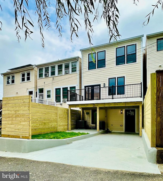 view of front of home featuring cooling unit