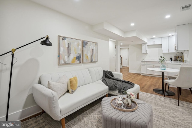 living room featuring light wood-type flooring