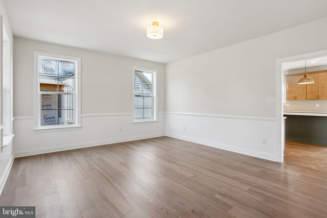 empty room featuring hardwood / wood-style floors