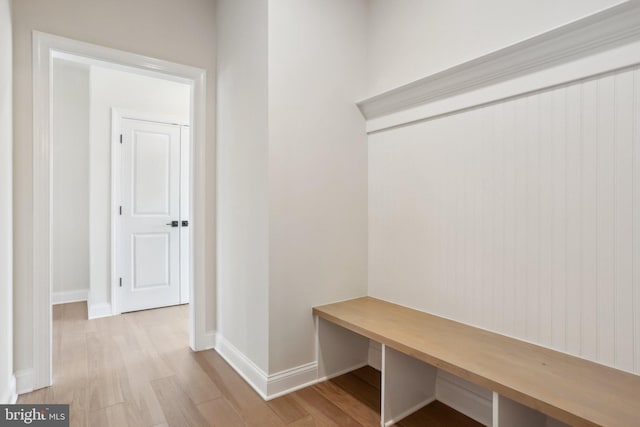 mudroom with light hardwood / wood-style floors