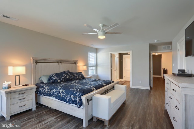 bedroom with dark wood-type flooring and ceiling fan