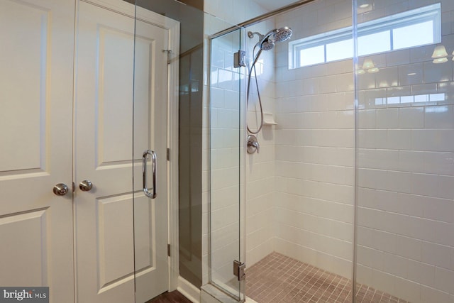 bathroom featuring walk in shower