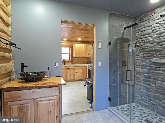 bathroom featuring vanity and walk in shower