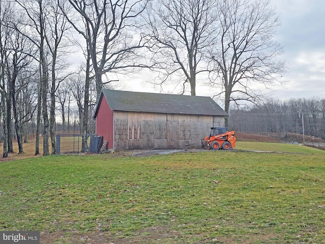 view of outdoor structure with a yard