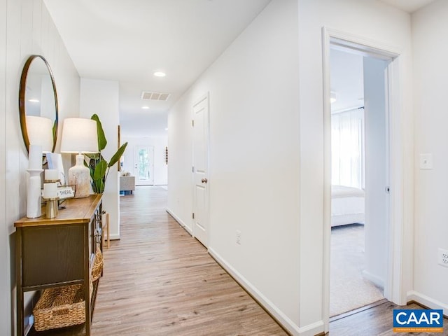 hall featuring light hardwood / wood-style floors