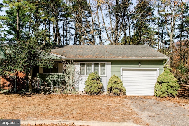 3 New Hampshire Ln Unit A, Whiting, NJ 08759 - view of front of house featuring an attached garage, driveway, and covered porch