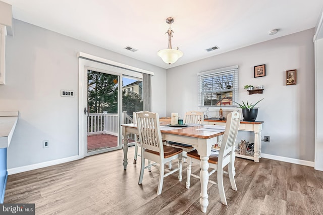 dining room featuring hardwood / wood-style floors