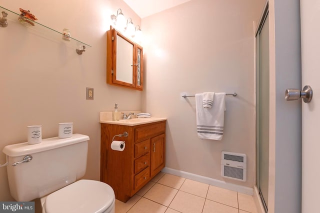 bathroom featuring vanity, tile patterned flooring, toilet, an enclosed shower, and heating unit