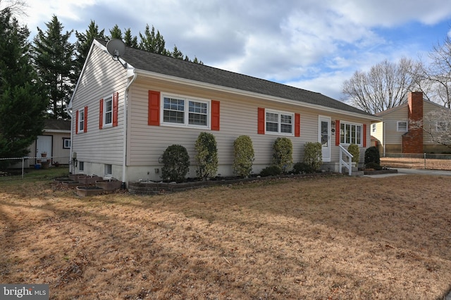 view of front of home with a front yard