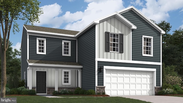 view of front of property featuring a garage and a front lawn