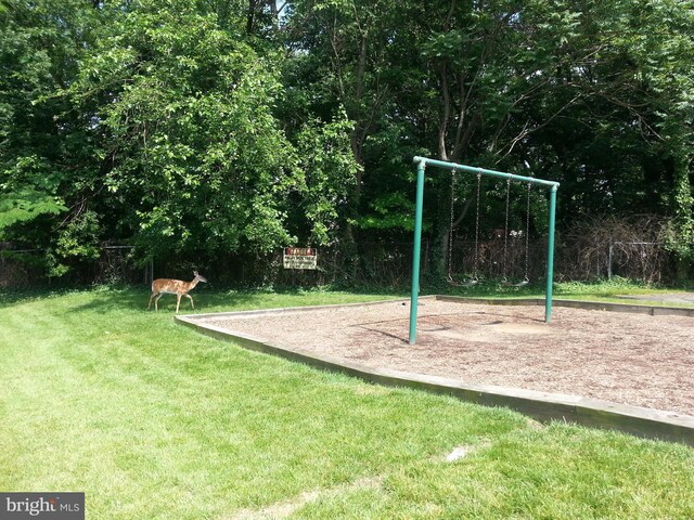 view of play area featuring a yard