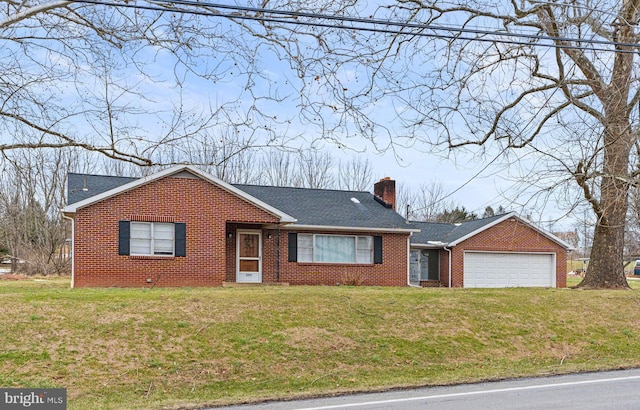 single story home with a front yard and a garage