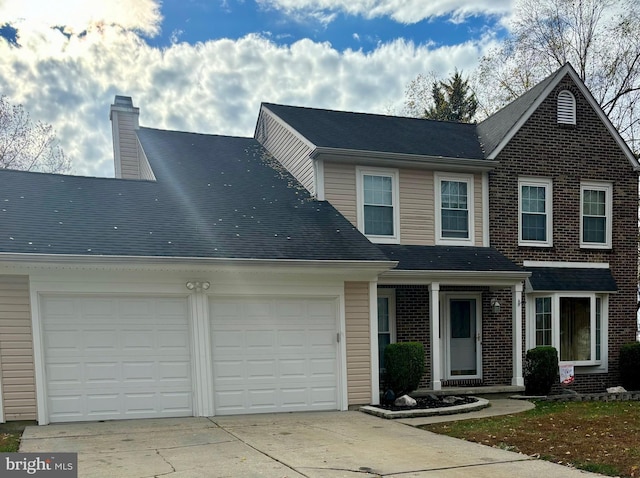 view of front of home with a garage