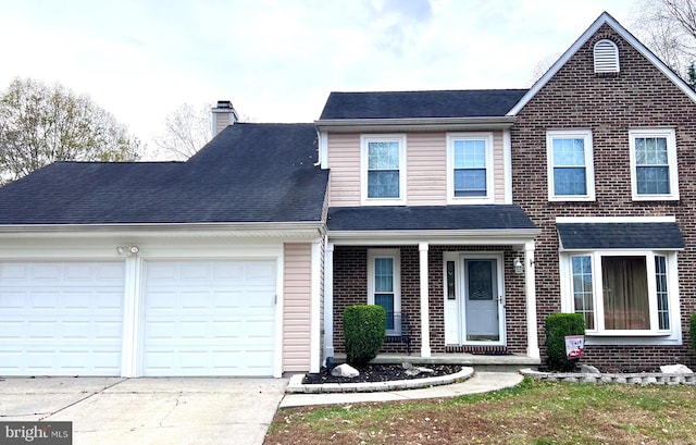 view of front of property featuring a garage