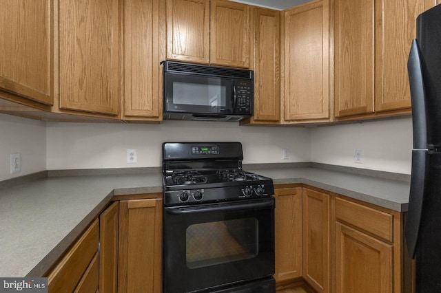 kitchen with black appliances