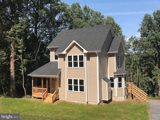 front facade with a front yard