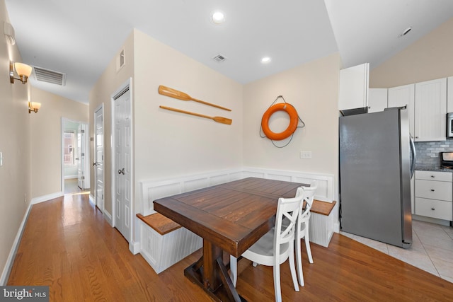 dining area featuring light wood-type flooring