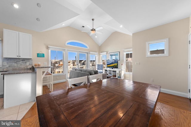 220 Taylor Ave, Beach Haven, NJ 08008 - dining area with ceiling fan, high vaulted ceiling, wood finished floors, baseboards, and recessed lighting