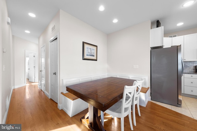 dining room featuring light wood-type flooring