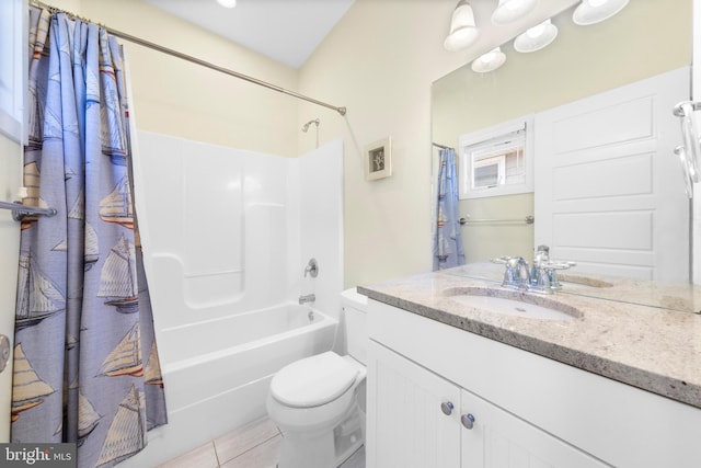 full bathroom with tile patterned floors, vanity, shower / bath combo, and toilet