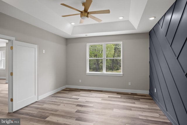 4540 Lake Rd, Newfield, NJ 08344 - unfurnished bedroom featuring a raised ceiling, light wood-type flooring, baseboards, recessed lighting, and ceiling fan