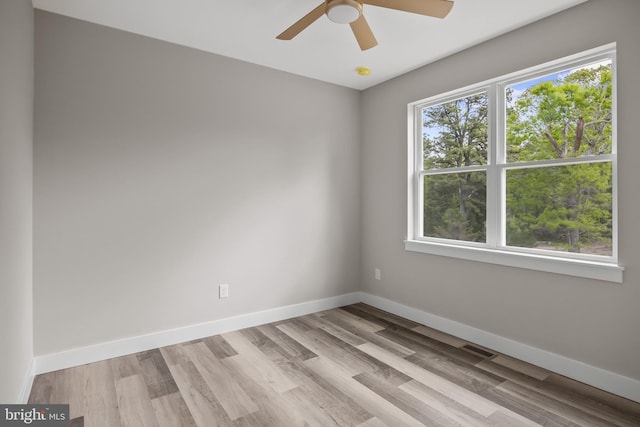4540 Lake Rd, Newfield, NJ 08344 - spare room with baseboards, light wood-style flooring, and ceiling fan