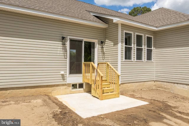 4540 Lake Rd, Newfield, NJ 08344 - doorway to property featuring a shingled roof and a patio