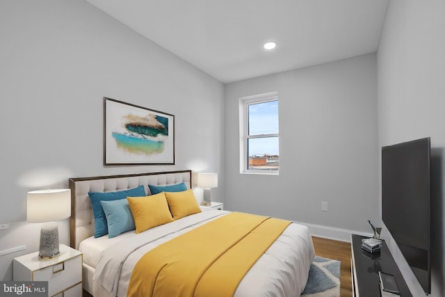 bedroom featuring wood-type flooring