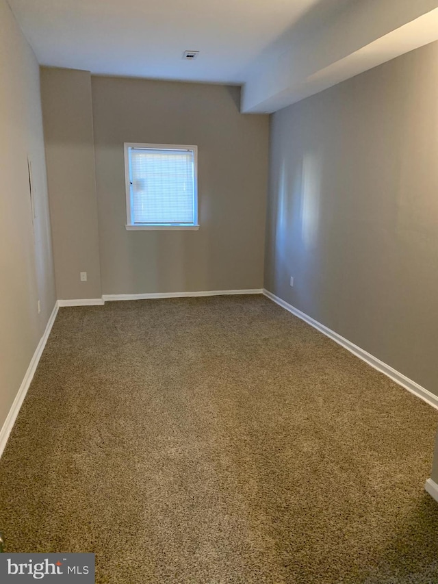 view of carpeted spare room