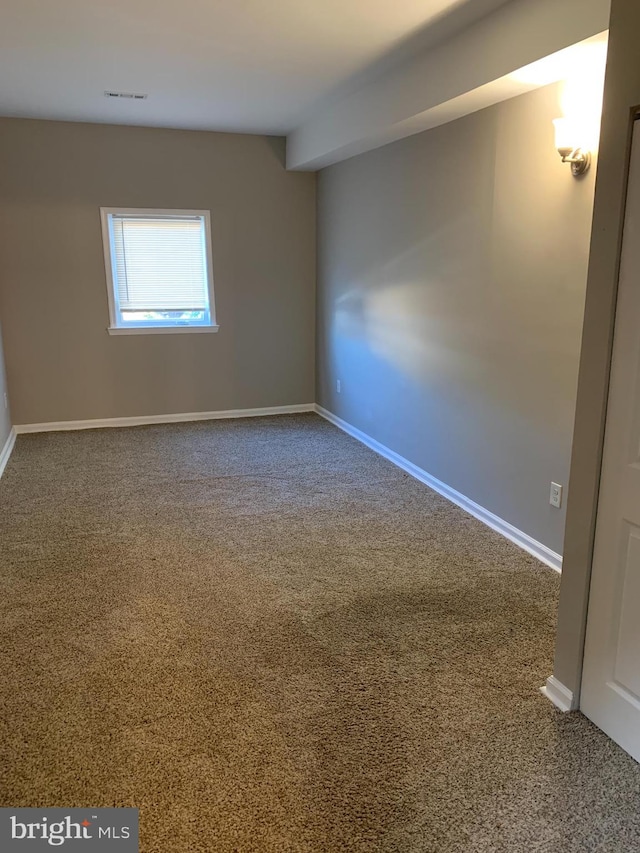 view of carpeted spare room